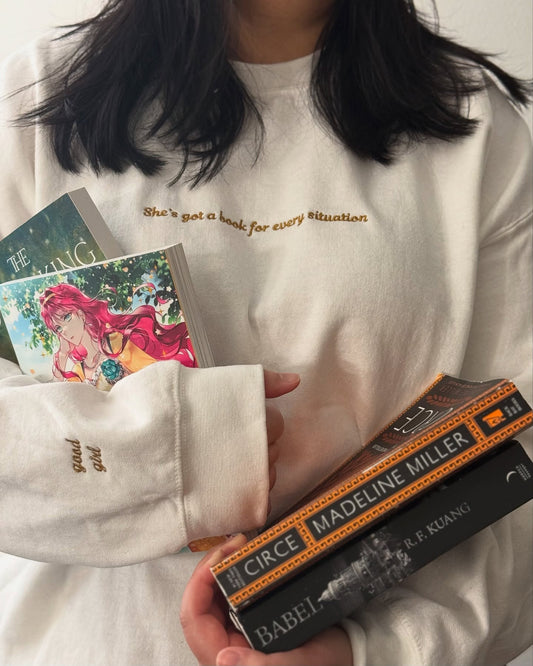 She's Got a book For every Situation Embroidered Sweatshirt - Thespicyromancebookclub LLC