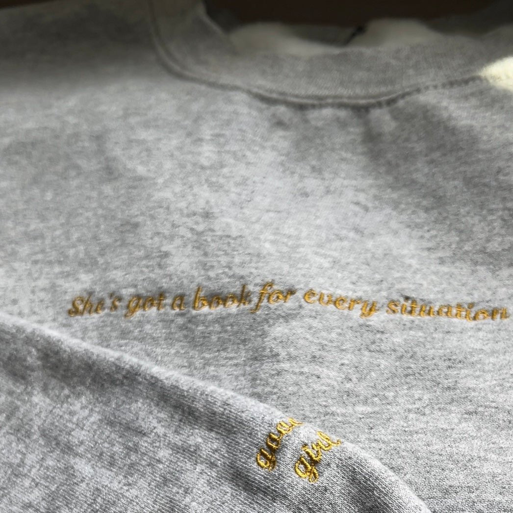 She's Got a book For every Situation Embroidered Sweatshirt